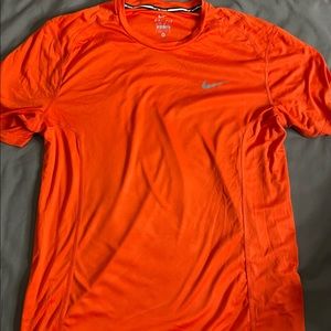 Orange Nike Dri-fit shirt (M)